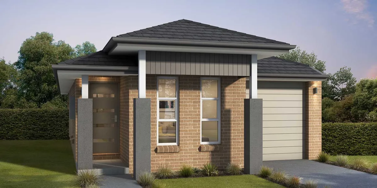 Modern single-story house with dark pitched roof, red brick facade, white trim columns, large windows, and a garage door on the right side. Featured landscaping includes ornamental grasses and green lawn surrounding the contemporary home design.